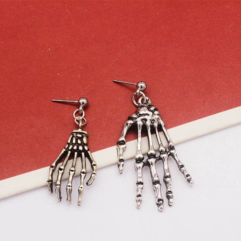 Women's Asymmetric Skull Hand Earrings